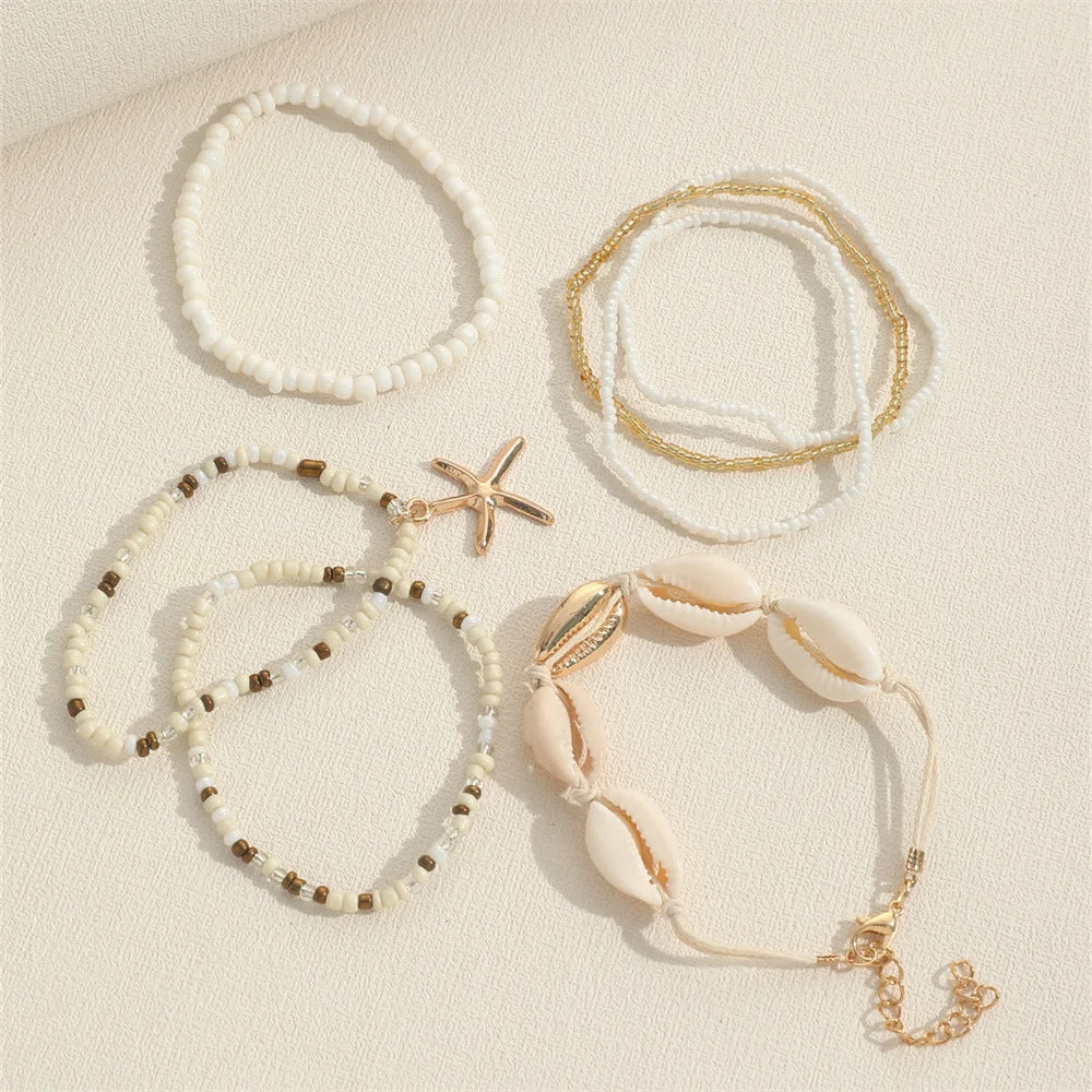 Conjunto de Pulseiras Búzios Dourados