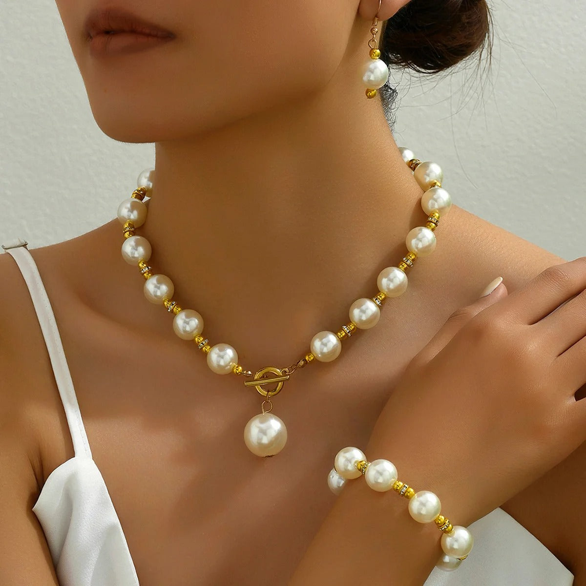 Conjunto Colar, Brinco e Pulseira de Pérolas Naturais