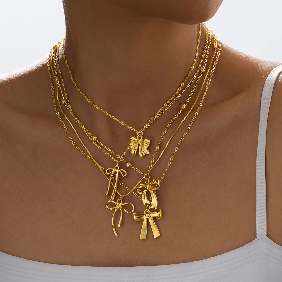 Conjunto de Colares Laços Dourados